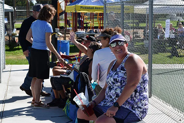 Photo of pickleball players taking a break at the A.C.E. tournament at Frontier Park, ID